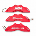 Red and white brake caliper keyrings in M, Brembo and AMG designs